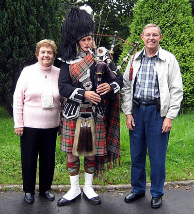 Ferrell and Elizabeth and a Scottish Bagpiper at Inveraray.