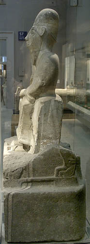 Left side of the throne.