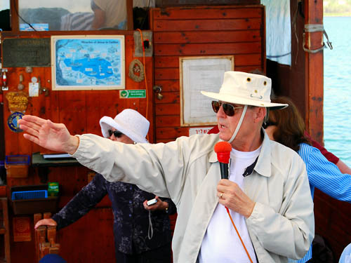 Ferrell Jenkins pointing out sites of interest on the shore of Galilee.