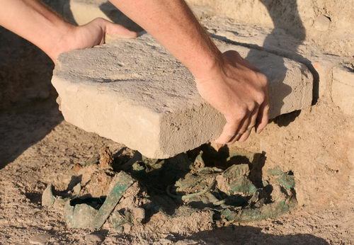 ziyaret_05_bronze-vessels-t Bronze vessels under paving stones at Ziyaret Tepe in SE Turkey.