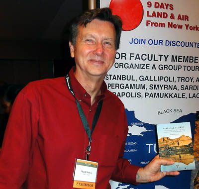 Mark Wilson shows his new book at SBL in Atlanta. Photo by Ferrell Jenkins.