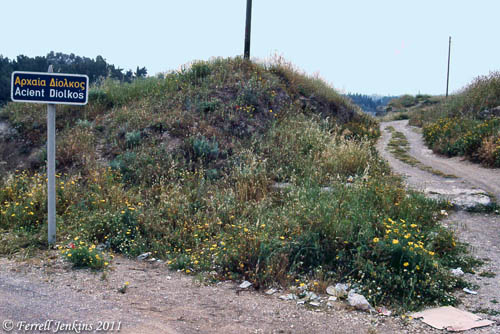 Diolkos Sign and a portion of Sector G. Photo by Ferrell Jenkins.