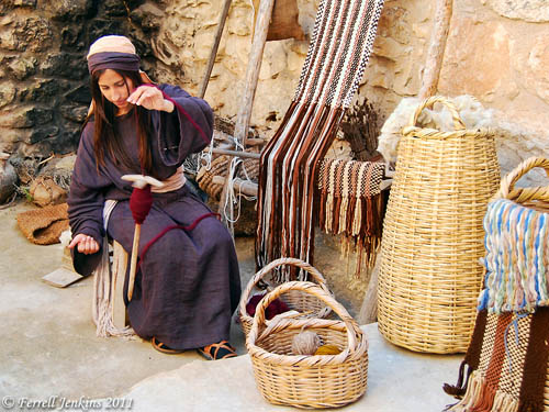 Spinning dyed wool in preparation for weaving on the loom. Photo by Ferrell Jenkins.