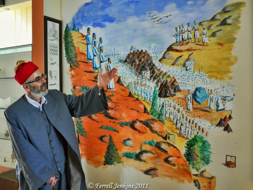 Samaritan priest explains the Samaritan view of the reading of the blessings and curses of the Law. Photo by Ferrell Jenkins.