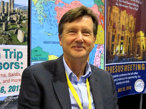 Mark Wilson mans the Tutku Travel booth.