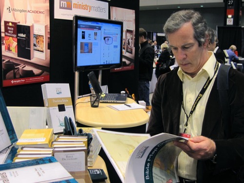 Dr. David McClister looks over a map book at AAR/SBL 2012. Photo by Ferrell Jenkins.