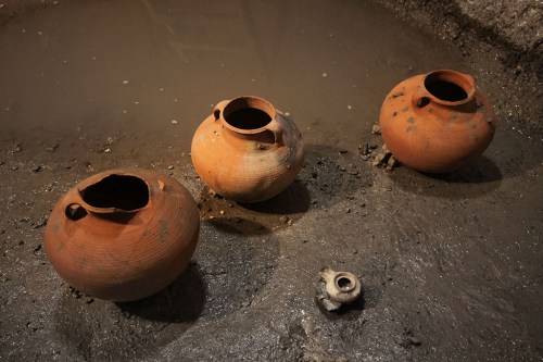 Cooking pots and lamp found in drainage channel near Robinson's Arch, Jerusalem. IAA Photo by Vladimir Naykhin.