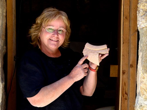 Dr. Eilat Mazar with Canaanite inscription.