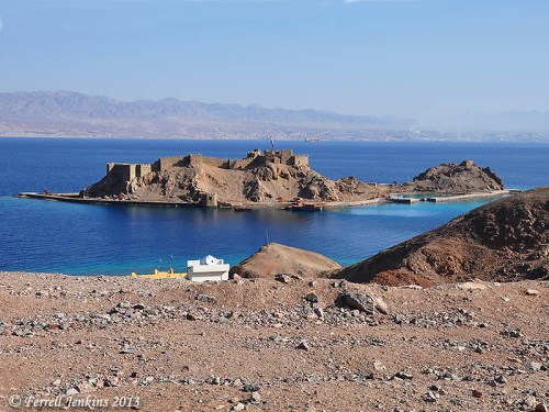View of Pharaoh's Island from the west. The view looks east across the Gulf of Eilat/Aqabah. The land in the distance is Saudi Arabia, the Biblical land of Midian. Photo by Ferrell Jenkins.