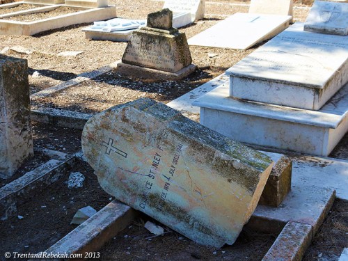Tomb of Clarence Fisher vandalized in Protestant Cemetery.