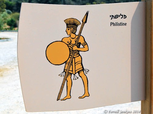 A row of signs at the entry to Tel Ashkelon picture some of the peoples who lived there. This sign represents the Philistines. Photo by Ferrell Jenkins.