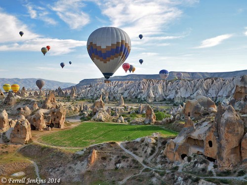 Hot air balloons are moved by the wind over the lunar-like landscape of Cappadocia while the pilots control their altitude. Photo by Ferrell Jenkins.