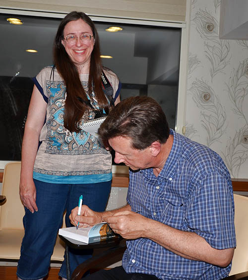 Dr. Wilson autographs a copy of Biblical Turkey for Stacy. Photo by Ferrell Jenkins.