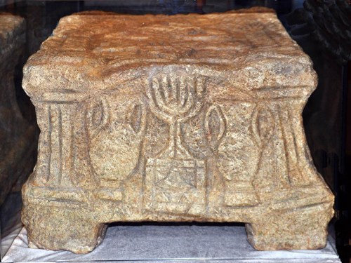 Magdala Synagogue Table. End view. Replica at Notre Dame, Jerusalem. Photo by Ferrell Jenkins.