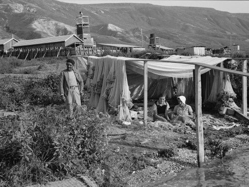 Girls of Ain Geb, a Jewish settlement on the east side of the Sea of Galilee. Girls of the settlement mending fishing nets. Photo: Eric Matson collection LOC.