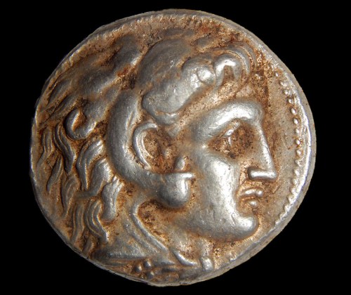 A coin of Alexander of Macedon that was part of the silver cache. Photographic credit: Shmuel Magal, courtesy of the Israel Antiquities Authority.