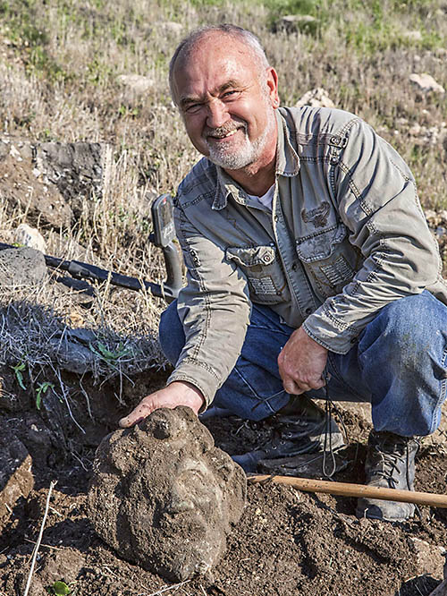 Dr. Alexander Iermolin immediately after uncovering the Pan mask at Hippos-Sussita.