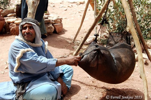 A Bedouin at Petra using an animal skin for churning. Photo by Ferrell Jenkins.