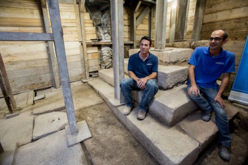 Szanton and Uziel sit on the recently uncovered podium. Photo: IAA