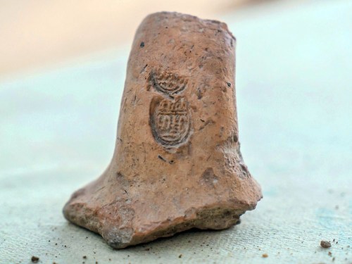 A stamped jar handle dating to the Middle Bronze Age. Photo: IAA.