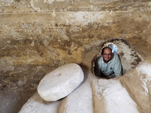 Abraham Tendler, the excavation director, inside a hiding refuge that was connected to a ritual bath (miqwe) during the Bar Kokhba uprising. Photographic credit: Assaf Peretz, courtesy of the Israel Antiquities Authority. 