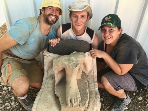 The three volunteer excavators who found the statue, from left to right: Valentin Sama-Rojo from Spain, Bryan Kovach from the United States, and Elanji Swart from South Africa. (Photo credit: Shlomit Bechar) 