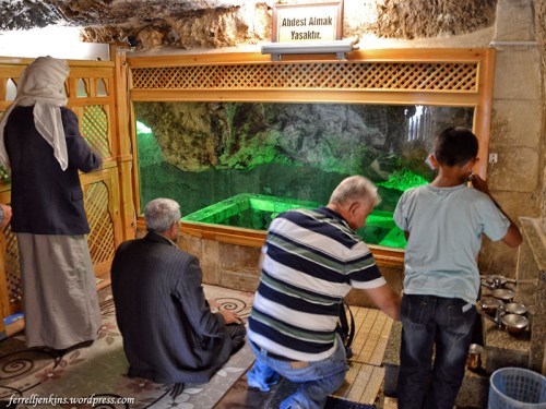 Men worship in the Cave of Abraham at Urfa. Photo by Ferrell 