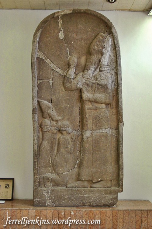 A broken relief showing Esarhaddon with two captured rulers, one on bended knee, before him. Photo by Ferrell Jenkins.