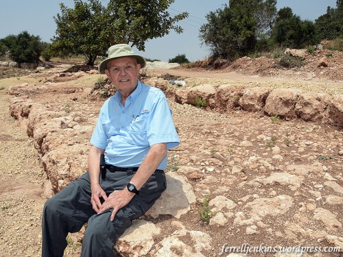 Ferrell Jenkins waiting on the curb of the Roman Road as it approaches the location of the Emperor's Highway. Photo by Leon Mauldin.