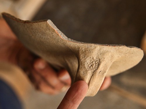 Jug handles with the rosette seal used by the administrative system at the end of the Judean Kingdom. Picture: Eliyahu Yanai, Courtesy of the City of David Archive