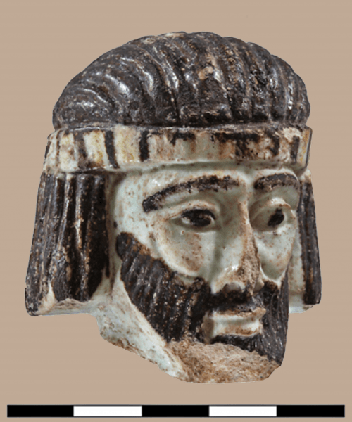 Faience head of a king discovered at Abel Beth Maacah in northern Israel. Photo released by Azusa Pacific University.