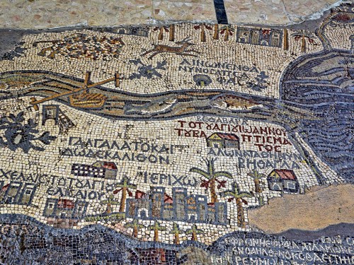 Photo of a portion of the Madaba Map showing the Jordan River and the Dead Sea. Fish are shown swimming to the Dead Sea and then turning back.