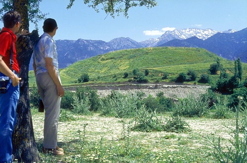 This photo shows Ferrell Jenkins and Melvin Curry gazing across  a small brook at the mound of ancient Colossae. Phil Roberts snapped the image.
